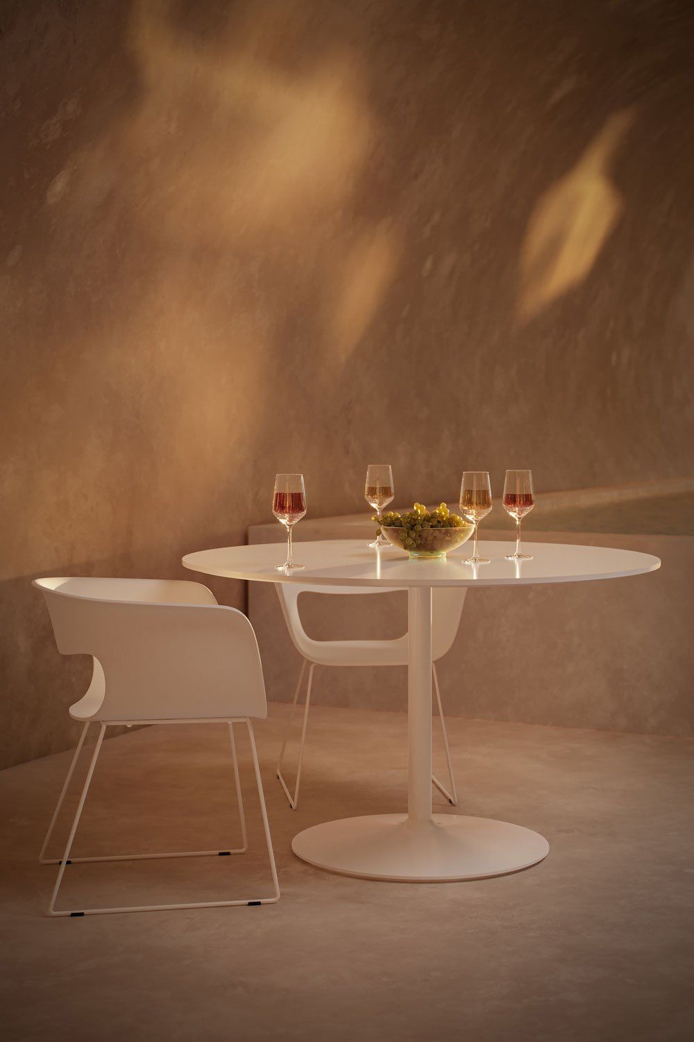 3D rendered image of a trendy dining table with chairs, showcasing photorealistic house fittings visualization and interior rendering.