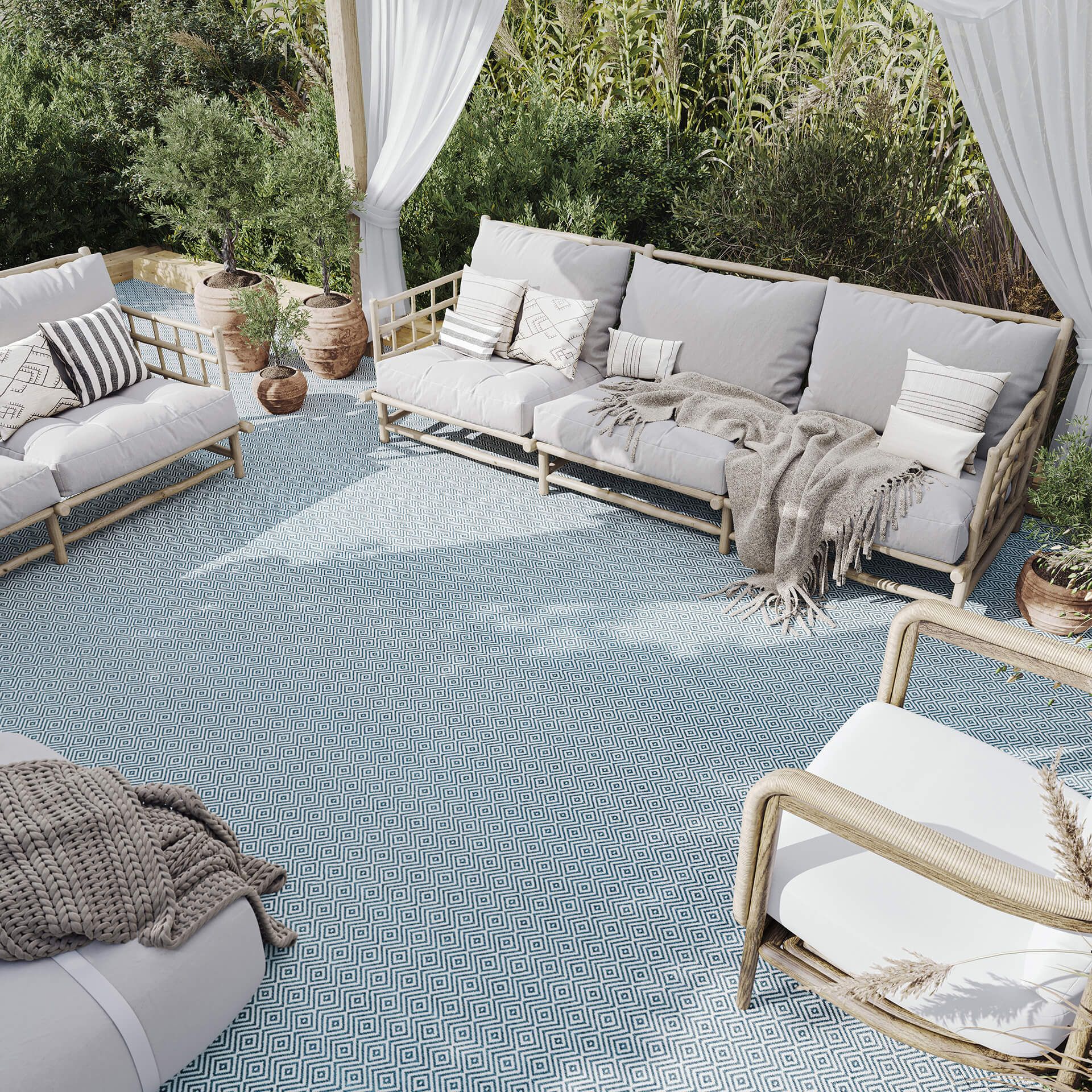 3D rendered image of an outdoor patio with a carpet and furniture