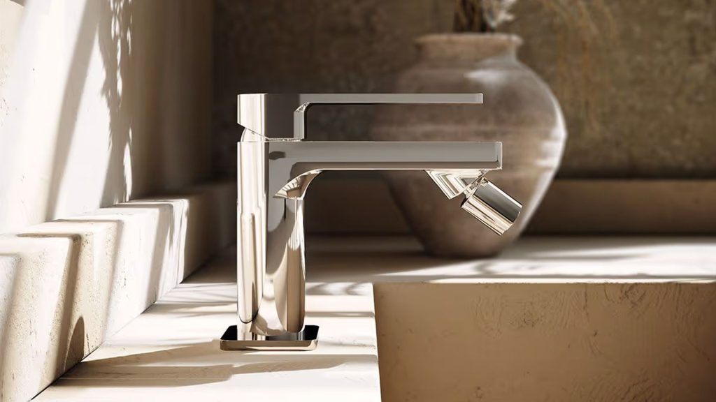 3D rendering of a modern chrome bathroom fixture placed on a stone countertop