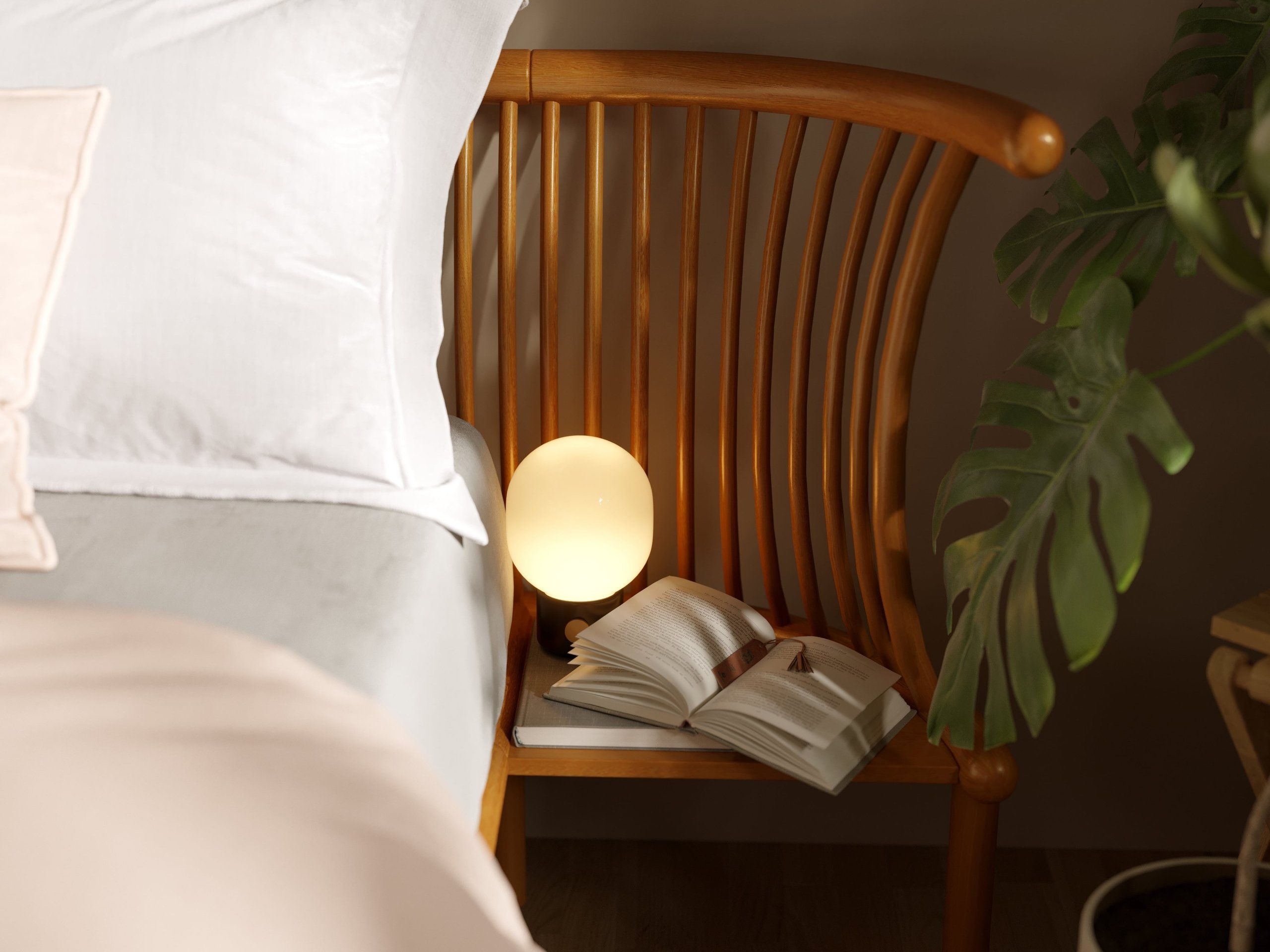 3D rendered image of a cozy bedroom scene featuring a wooden chair, open book, and soft lighting, showcasing realistic furniture rendering and 3D interior visualization.