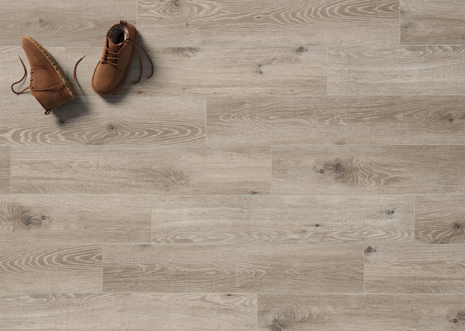 3D visualization of beige wooden flooring with visible shoe pair placed on surface in top view