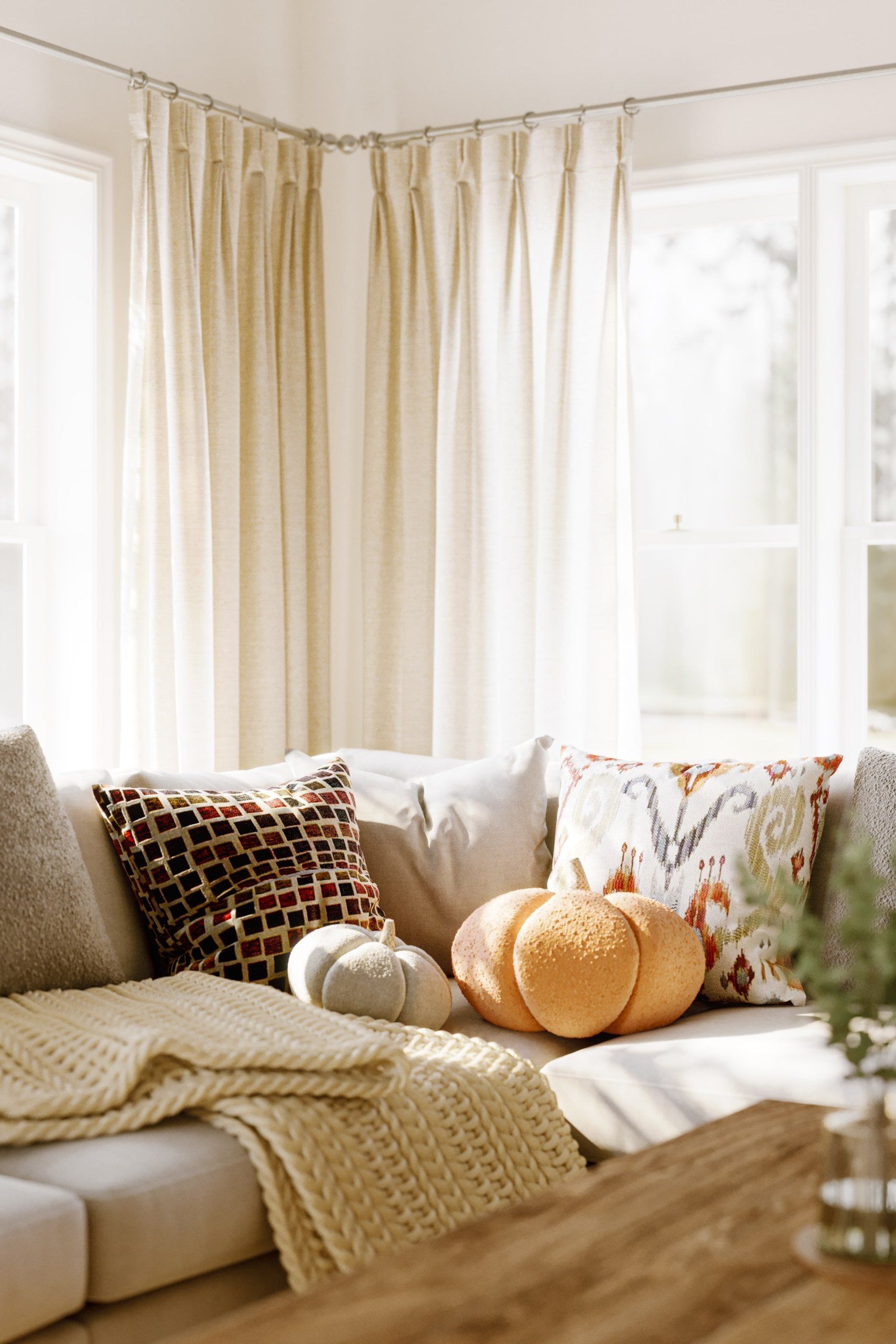 3D rendered image showcasing a cozy living room with textured pillows, highlighting 3D furniture modeling and realistic interior visualization.