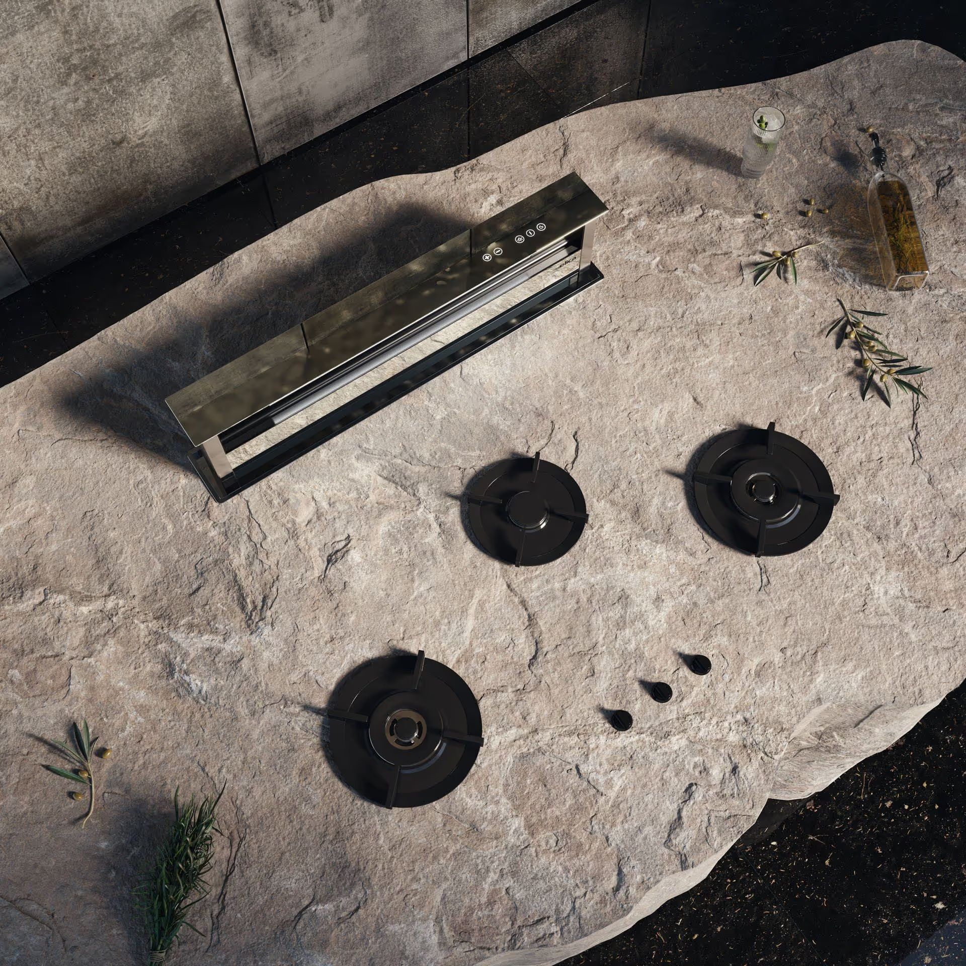 Top view of a modern gas cooktop set into a stone surface with burners and control panel shown in product visualization