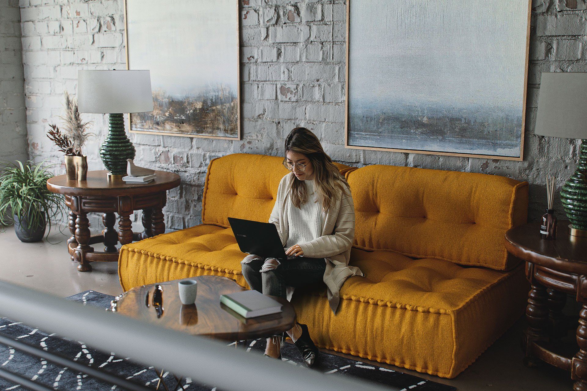 Contemporary living room render: mustard-colored sofa in neutral-toned interior CGI