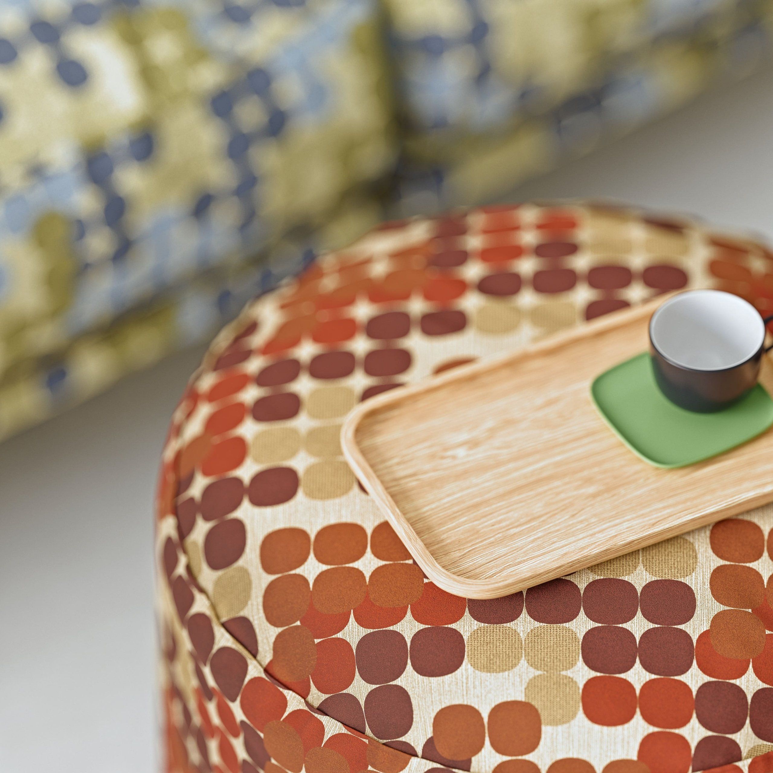 3D rendered image of a custom ottoman with a tray and cup, showcasing realistic furniture rendering and 3D product visualization.