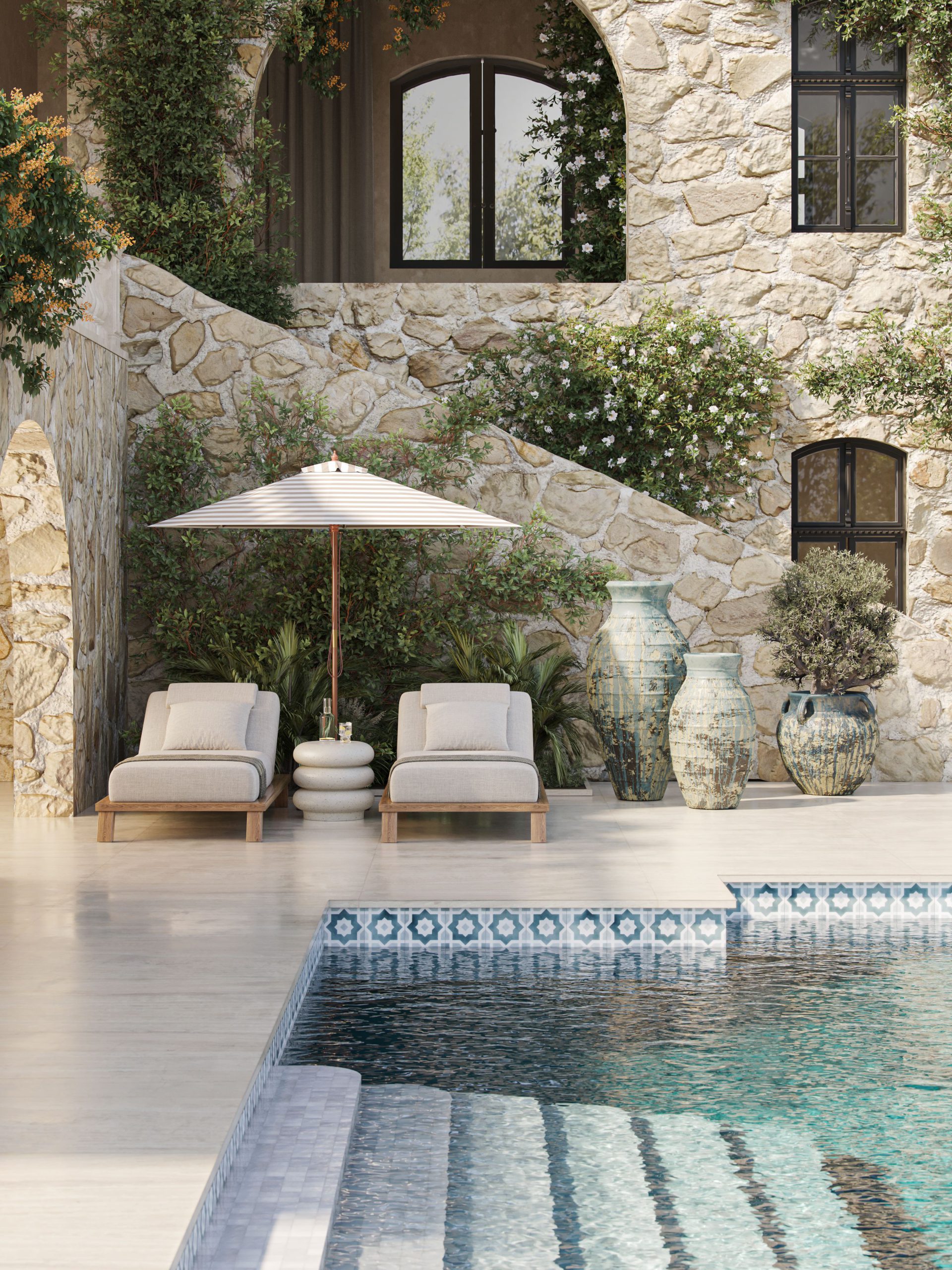 CGI visualization of blue ceramic planters, glazed vases, and a stone umbrella base on a Mediterranean poolside patio with loungers, striped parasol, and tiled pool edge