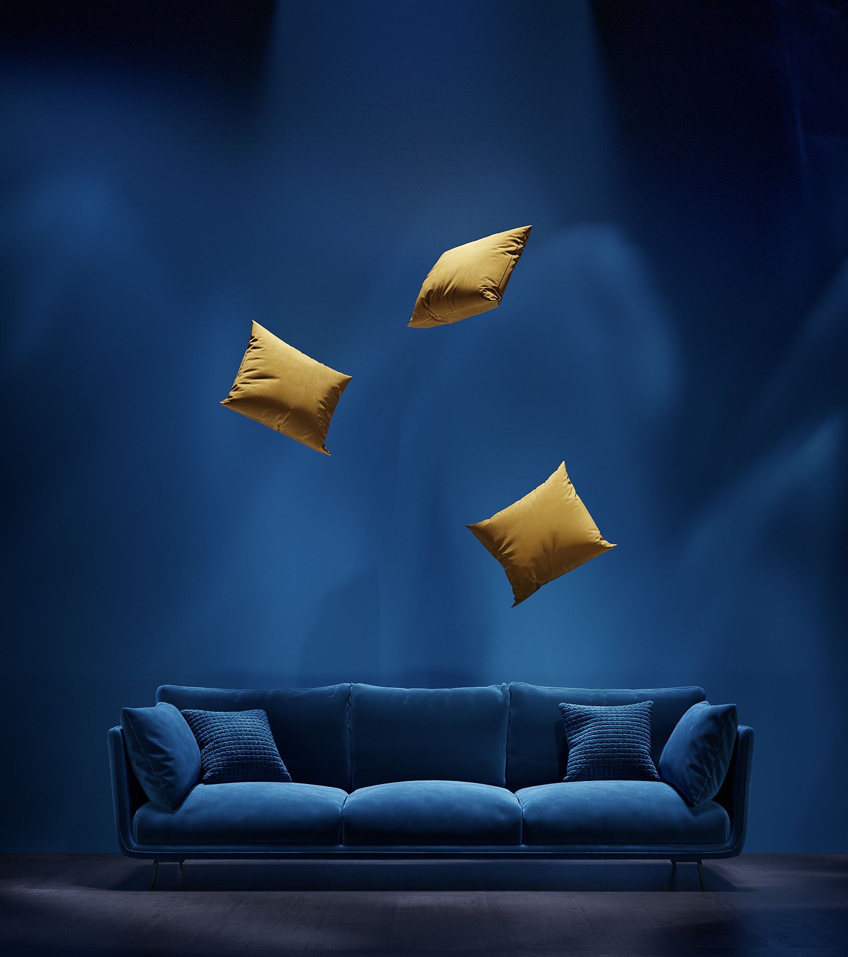 3D product animation preview: blue sofa and floating pillows in a stylized studio setting