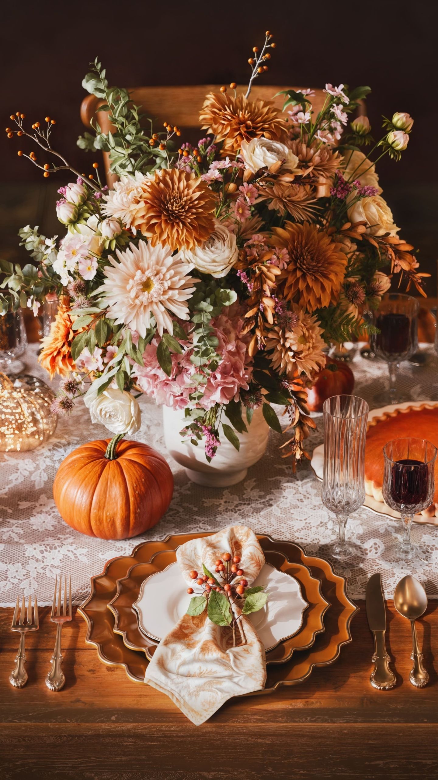 Product Rendering of Thanksgiving Table Setup with Flowers and Pumpkins