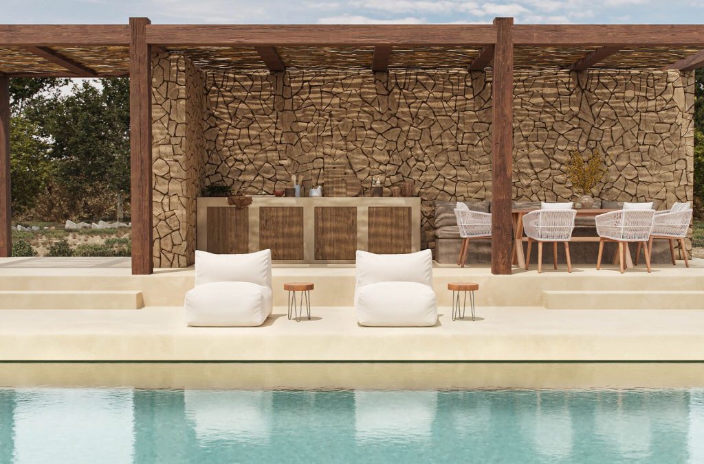 Two cushioned loungers placed poolside beside a stone wall and greenery in a calm outdoor 3D visualization.
