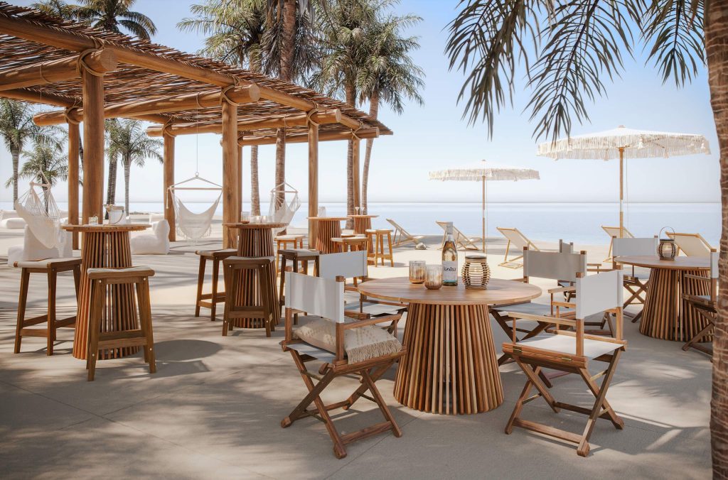 Dining table and chairs beneath a wooden pergola on a seaside terrace, shown in a 3D rendering of a relaxed hospitality exterior